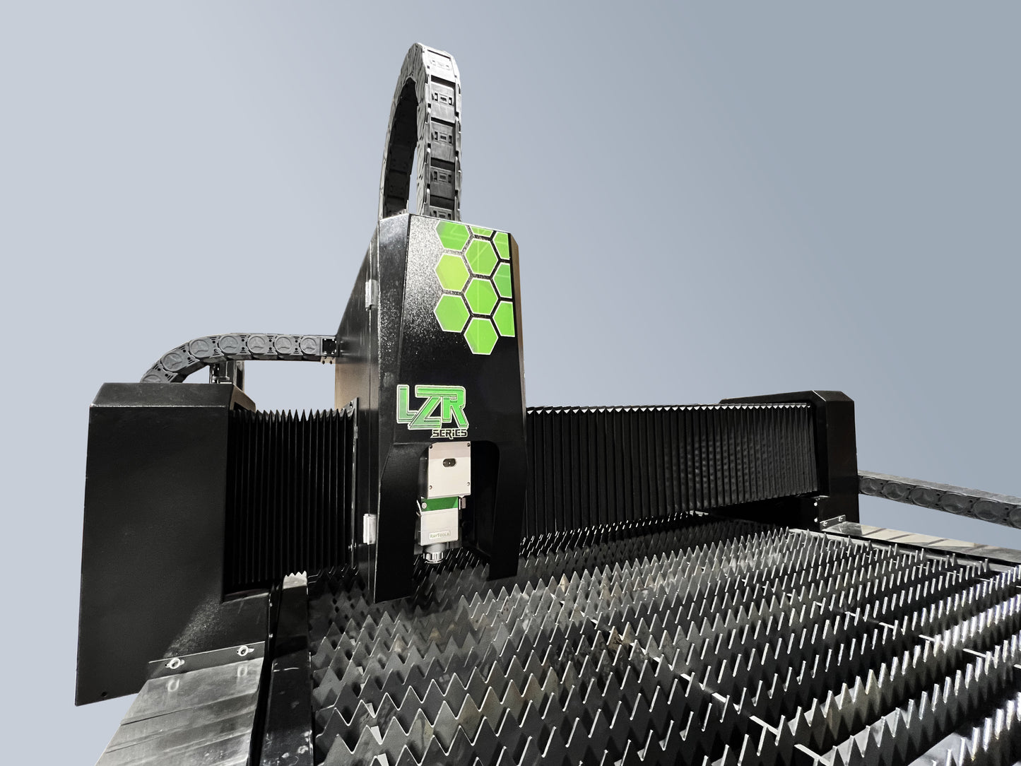 CNC Fiber Laser machine with a green logo on a gray background