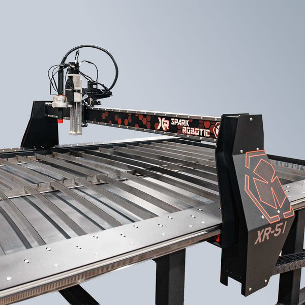 CNC Plasma machine with 'Spark Robotic' branding on a gray background