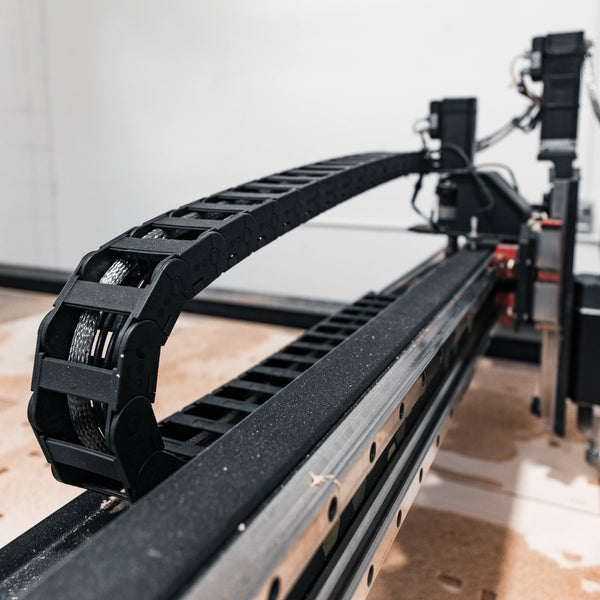 Wiring harness motion system on a CNC router table