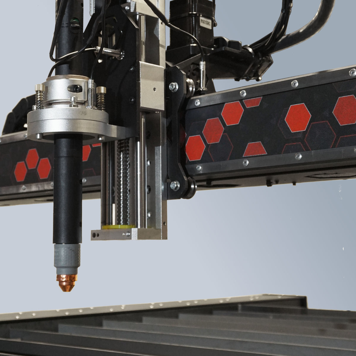 Close up of plasma cutter on a Spark Robotic XR-51 CNC plasma machine